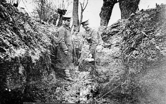 Scots Guards digging out mud from a trench near Rue Petillon, 19 November 1914